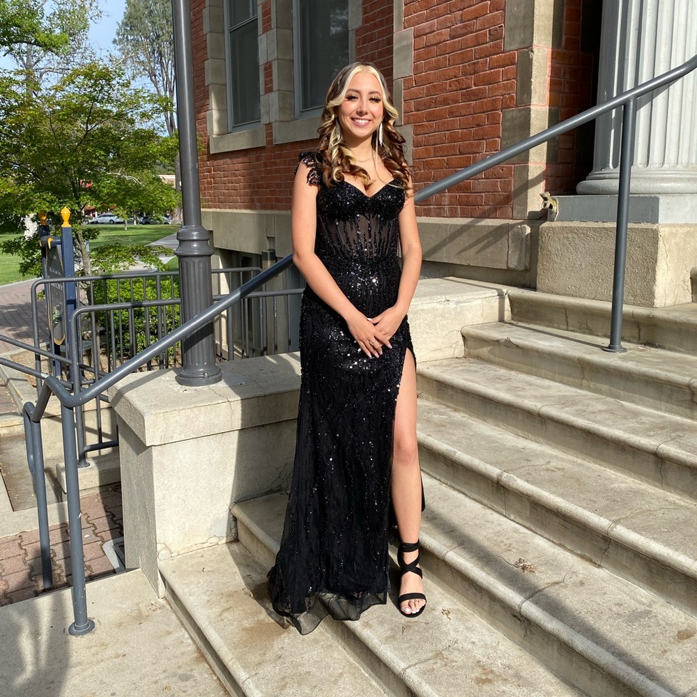 Black sparkling and beaded prom dress size 4.